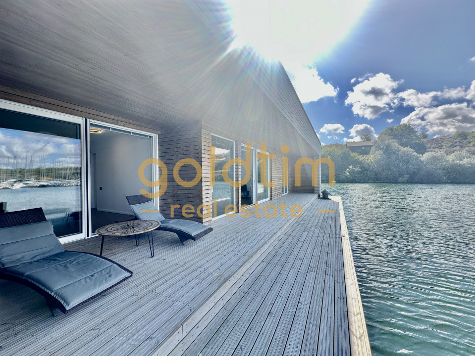 CASA PLUTITOARE/CONSTRUCTIE BETON PLUTITOR/UNICA IN ROMANIA/5 LOCURI DE ACOSTARE